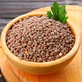 A heap of akkha mhasur lentils in a bowl.